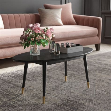 Cheap Black Oval Coffee Table With Gold Capped Legs Subtle Glam Living