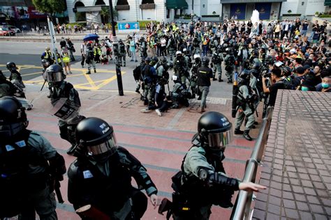 Hong kong protesters escape from police by fleeing along nan liang garden in diamond hill, near wong tai sin, on october 1, 2019. Chaos at Hong Kong's harbourfront as police, protesters ...