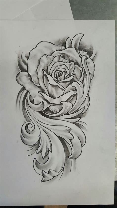 A rose tattoo meaning love won or lost has been popular throughout the ages as a symbol of the highest level of passion. Rose with flourish tattoo design | Flourish tattoo ...