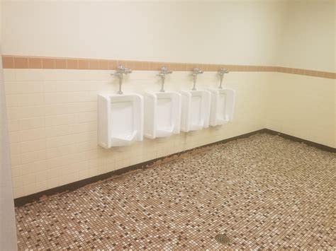 The Spacing Of These Urinals Rmildlyinfuriating