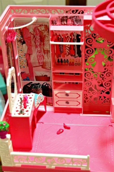 barbie s moved into the new barbie dream house barbieismoving this mama loves