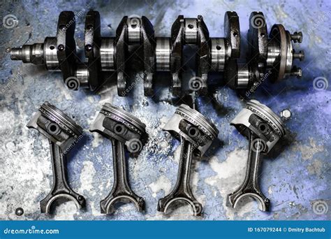 Crankshaft And Pistons With Connecting Rods On The Table Stock Photo