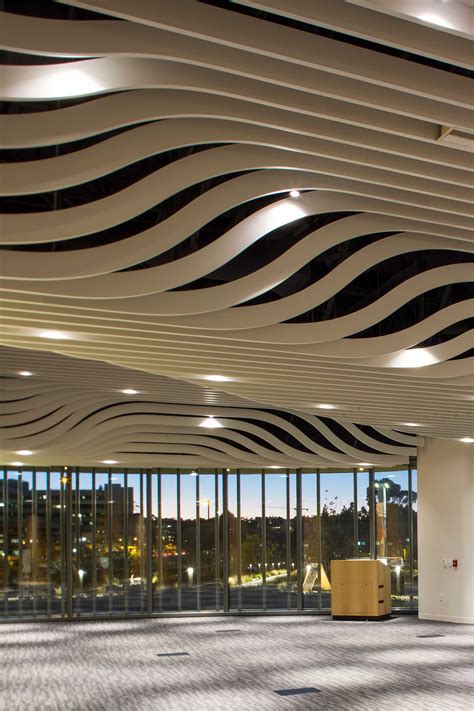 High Profile Series Vertically Curved Baffles Ceilings Bring A Wave Of