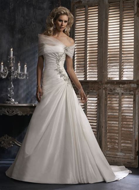 Designing wedding gowns for over 20 years. Maggie Sottero Wedding Dresses | Wedding dresses, Unusual ...