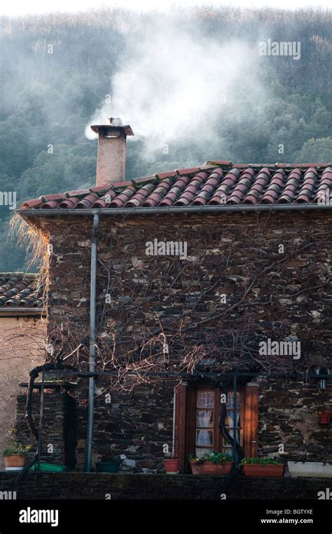 Smoke Coming From Chimney In A House In St Martial Medieval Village In