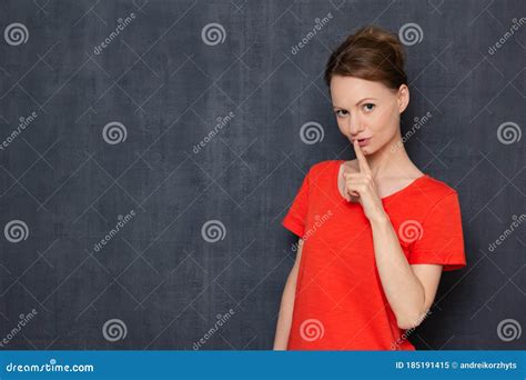 Portrait Of Flirty Girl Smiling And Showing Silence Sign Stock Image Image Of European
