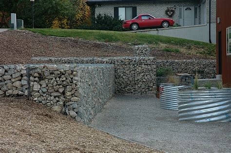 Due to how they are built, gabion … Pin by Colleen Kelvin on Landscaping / Gardening | Backyard landscaping, Backyard, Garden wall