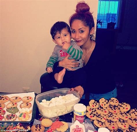doting mother snooki spends day baking with son lorenzo before getting glammed up to promote