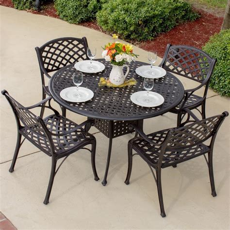 Heritage Piece Cast Aluminum Patio Dining Set With Round Table By Lakeview Outdoor Designs