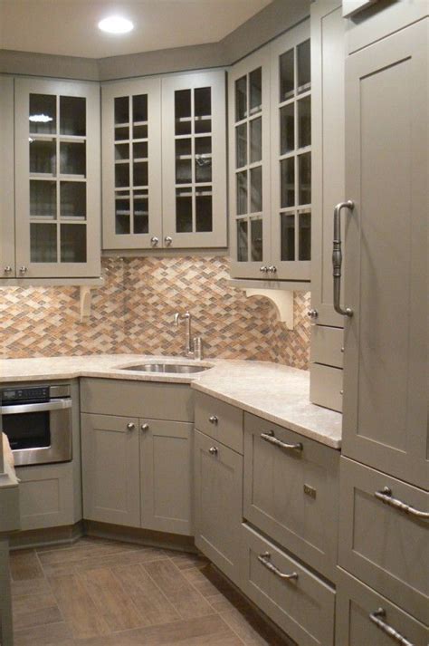 A single, large bowl provides ample space to soak and wash cookware, while a sloped base to a single offset drain minimizes water pooling. Corner Kitchen Sink | Kitchen sink design, Corner sink ...