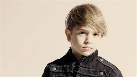 Haircuts for boys with long hair. Trendy haircut with a long fringe for little boys