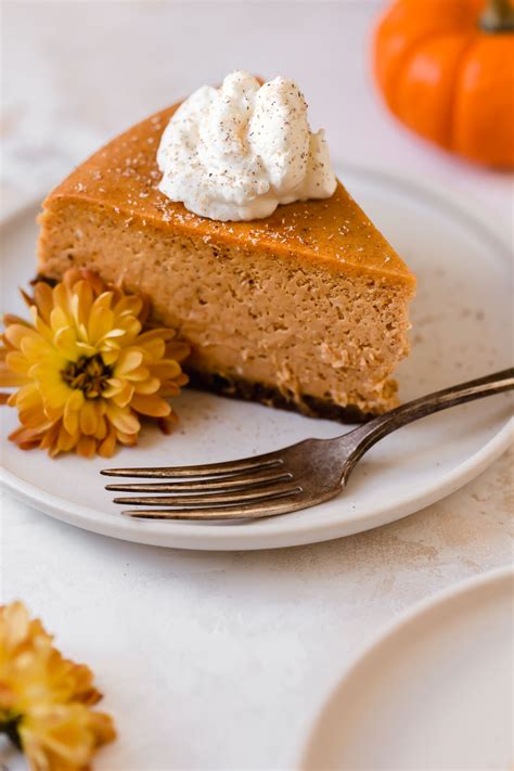 perfect pumpkin cheesecake with gingersnap crust plays well with butter