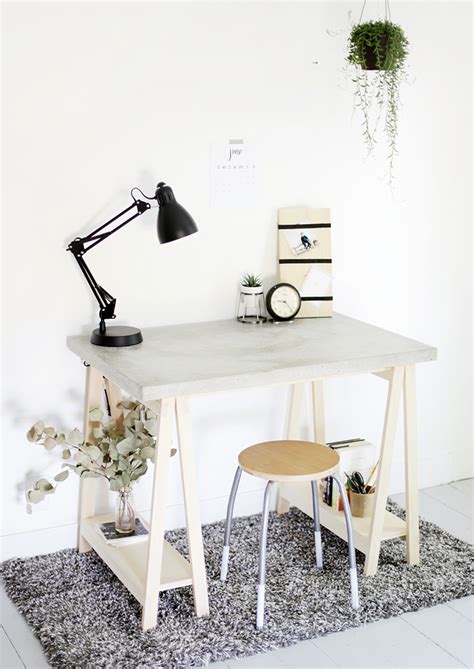 A bar cart should never be a luxury — we'll drink to that! DIY Concrete Desk - The Merrythought