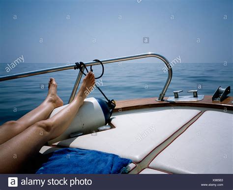 Sunbathing On Boat Deck High Resolution Stock Photography And Images