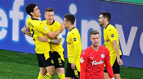 Die mannschaft von trainer friedhelm funkel gewann mit dem starken österreicher florian. Final-Ticket gelöst: Borussia Dortmund überrollt Holstein ...