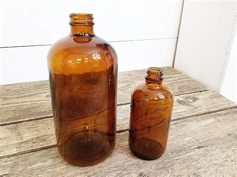 Vintage Amber Glass Bottles Set Of Two Large And Small Etsy
