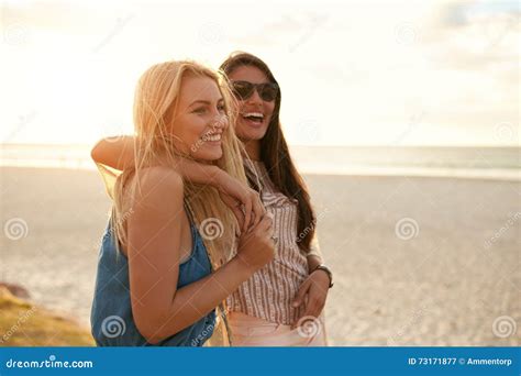 best friends enjoying summer vacation on beach stock image image of elegant enjoy 73171877