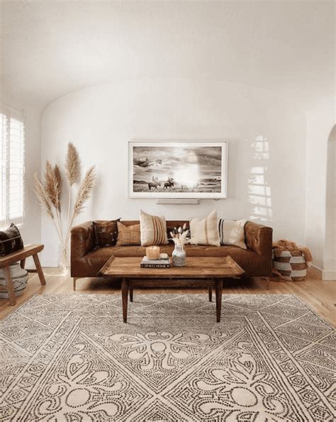 Floral pattern and threadbare carpet, are key elements at decorating a living room in shabby chic style. 20 Impressive Living Room Design with Boho Style - Talkdecor