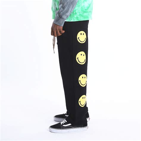 smiley face casual pants on storenvy