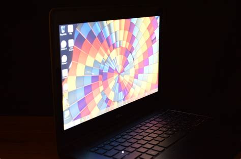 Under the 'display' category, select 'rotate display' from the left menu. Dell Inspiron 14 5000 Series Review