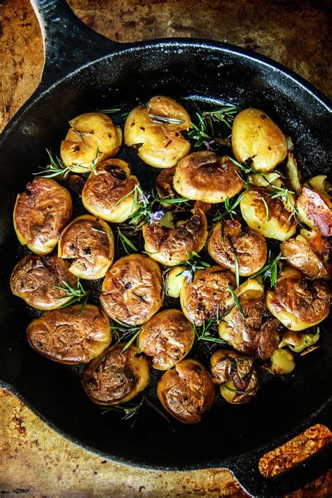 A catfish recipe for whole catfish paired with a slaw featuring asian spices and vegetables. Pan Fried Crispy Smashed Rosemary Bacon Garlic Potatoes from HeatherChristo.com in 2020 | Garlic ...