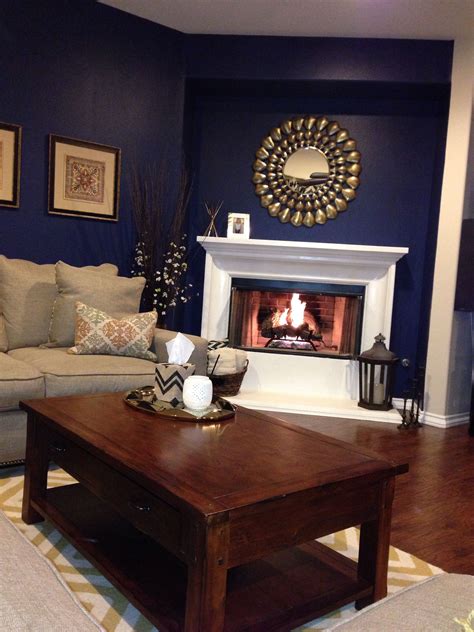 Navy Blue Walls Gold Accents And A Super White Fireplace My