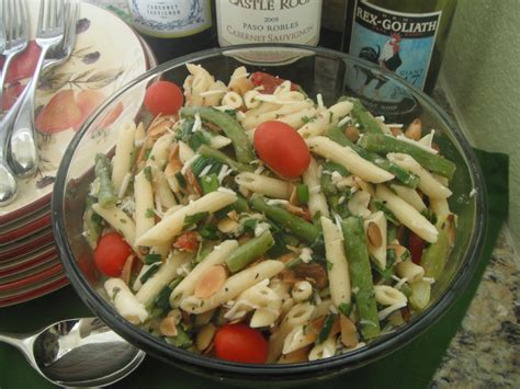 Add the artichokes, broccoli, provolone cheese, salami, peppers, beans, olives, onion and garlic. The Best Pasta Salad Recipe Ever (Made With Girard's ...