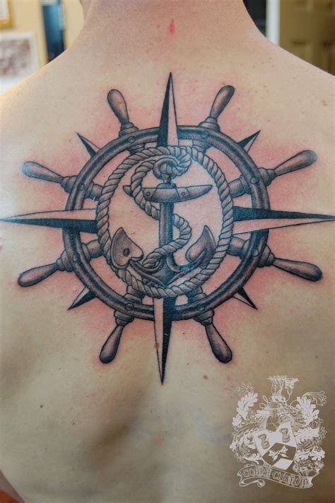Sketched anchor, wheel, and compass. Compass anchor tattoo | Anchor tattoo design, Wheel tattoo ...