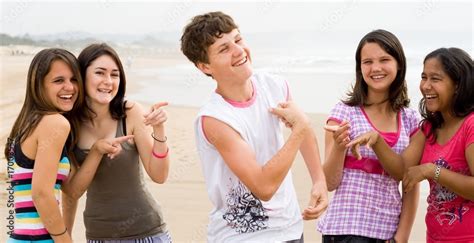 Teen Girls Teasing Boy Stock Photo Adobe Stock
