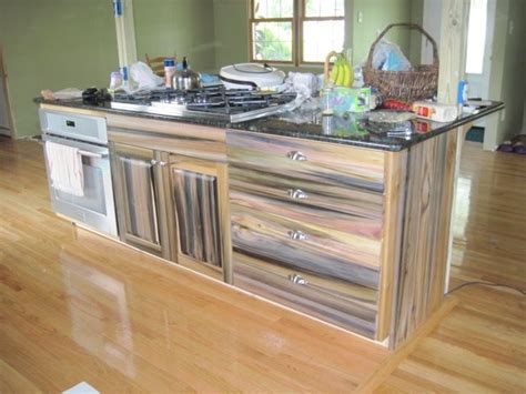 If the budget for a cabinetry run is low, but the space calls for a dark hardwood appearance, then considering poplar would be an excellent alternative choice. Reclaimed Purple Poplar Kitchen Island - Glemanandsons.com ...