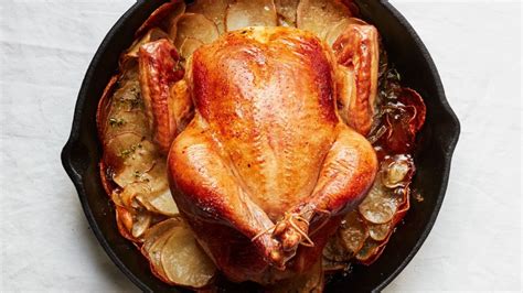 My whole family loves chicken and mushrooms and this looks just too good to pass up! Cast-Iron Roast Chicken with Crispy Potatoes | Recipe in 2020 (With images) | Cast iron roasted ...