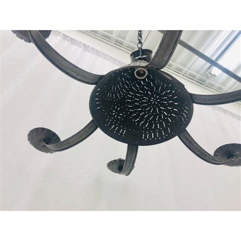 This one of a kind lighting fixture combines 4 different ceiling tins into a sizable structure that comes fitted with 42. Vintage Pierced Tin "Whalers Style" Chandelier | Chairish