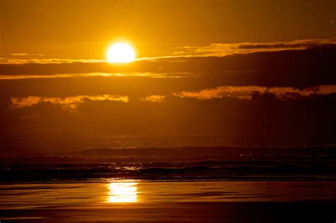 Cannonbeachphoto Orange Sunset Over The Pacific Ocean Horizontal