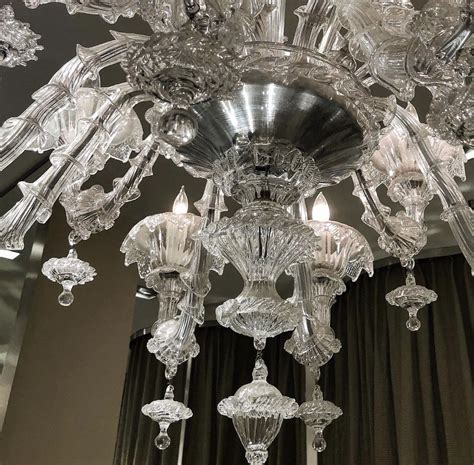 A Crystal Chandelier Hanging From The Ceiling
