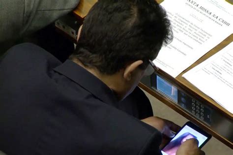 effiong eton caught red handed mp spotted watching porn on his phone in parliament then