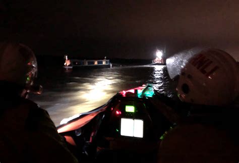 Lifeboat Volunteers In Late Night Canal Boat Rescue Rnli