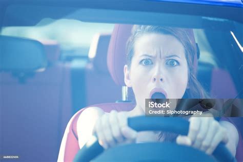 Fright Face Woman Driving Car Wide Open Mouth Eyes Strongly Squeezing