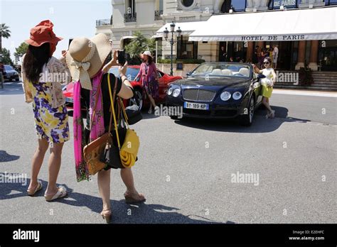 Europe Principality Of Monaco Tourists Looking At Luxury Cars Dropped
