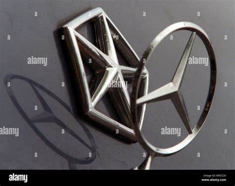 View Of The Two Emblems Of The Vehicle Manufacturers Daimler Benz And