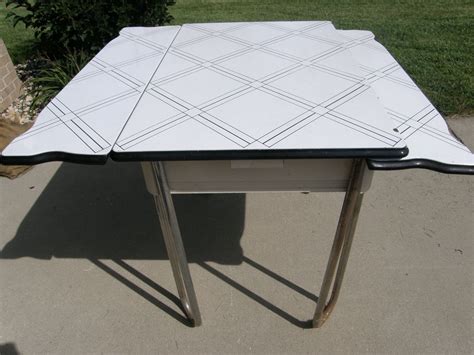 1950s kitchen old kitchen kitchen paint kitchen ideas rustic kitchen ranch kitchen updated kitchen two tone kitchen cabinets white this table is a kitchen master by the douglas corporation and features a red formica top and chrome base. WONDERFUL ENAMEL KITCHEN Table///1950s by ...