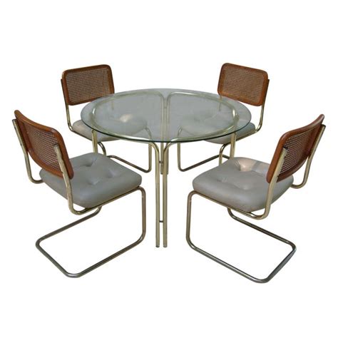 Maybe you would like to learn more about one of these? Brass & Glass Dining Table & 4 Cesca Style Chairs | Chairish