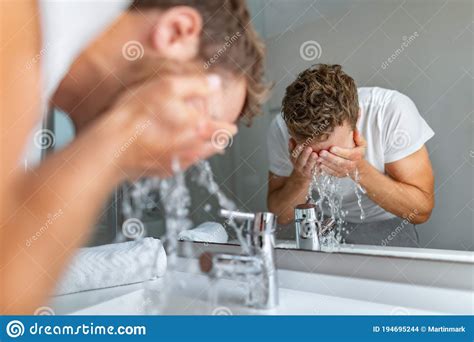 Face Wash Man Splashing Water Cleaning Washing Face With Facial Soap In Bathroom Sink Men