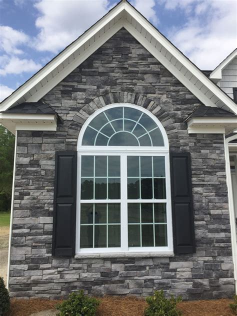 Neutral grey monochromatic home design. Kingsford Grey House Siding - Stack-A-Stone