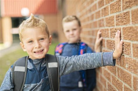 A Back To School Two Happy Little Boy With Backpack Stock Photo