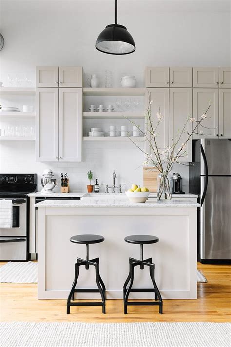 Each kitchen has copious amounts of natural light the colonial designed windows allow enough light to accentuate the adventurous red walls and proving that islands and dark colored cabinetry can work for smaller kitchen spaces, this design. One Wall Kitchens With Islands Ideas and Tips | Hunker
