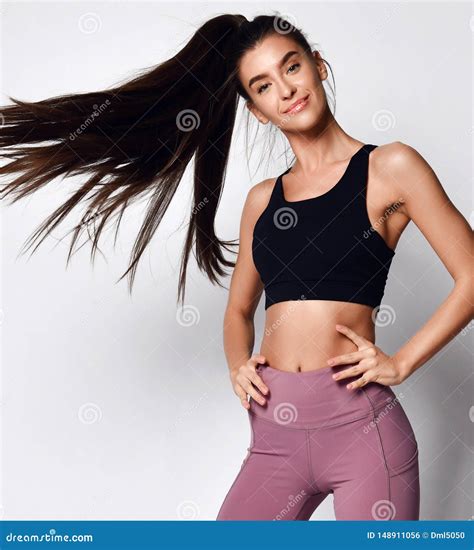 Sporty Slim Brunette With Ponytail Fitness Woman Enjoys Workout