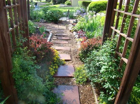Classic landscape with trimmed shrubs and nicely cut grass. front yard landscape design ideas with no grass | Access ...
