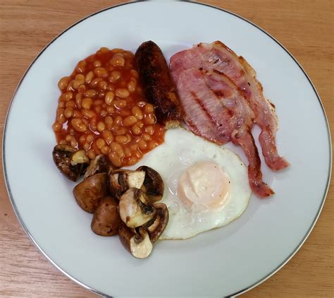 Sausage, bean & bacon bake. Annie's Guest House Full English Breakfast Menu