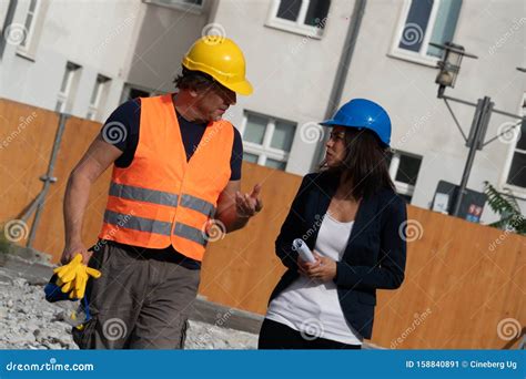 Foreman And Engineer On Construction Site Stock Image Image Of