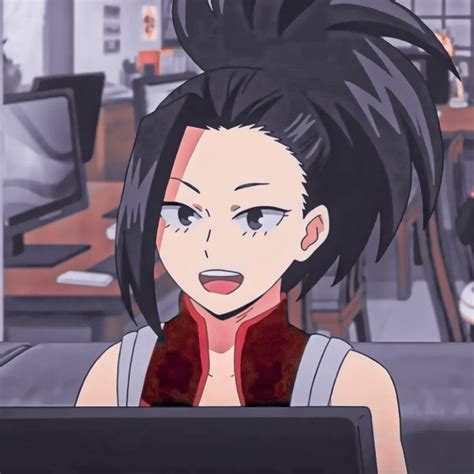 An Anime Character With Black Hair Looking At A Computer Screen That